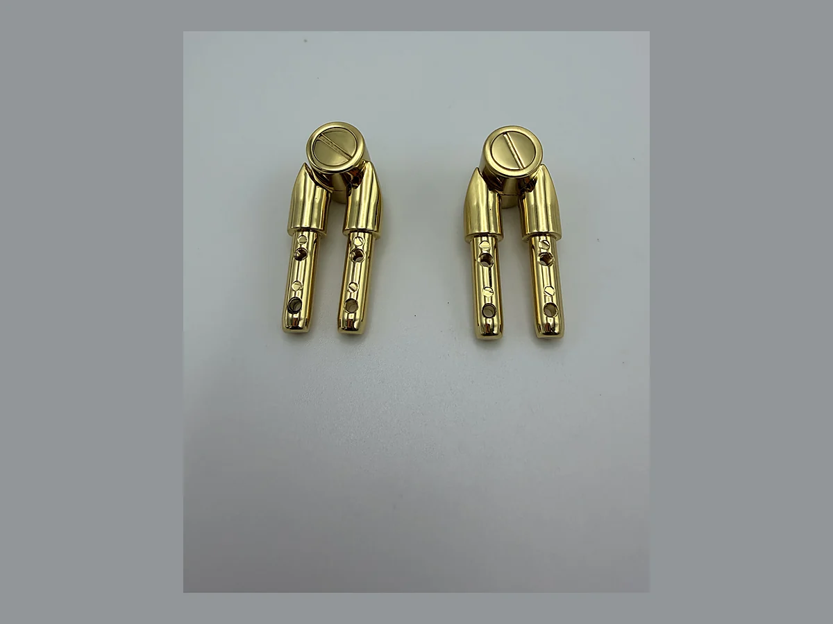Two pairs of compact gold multi-pin hinge fittings