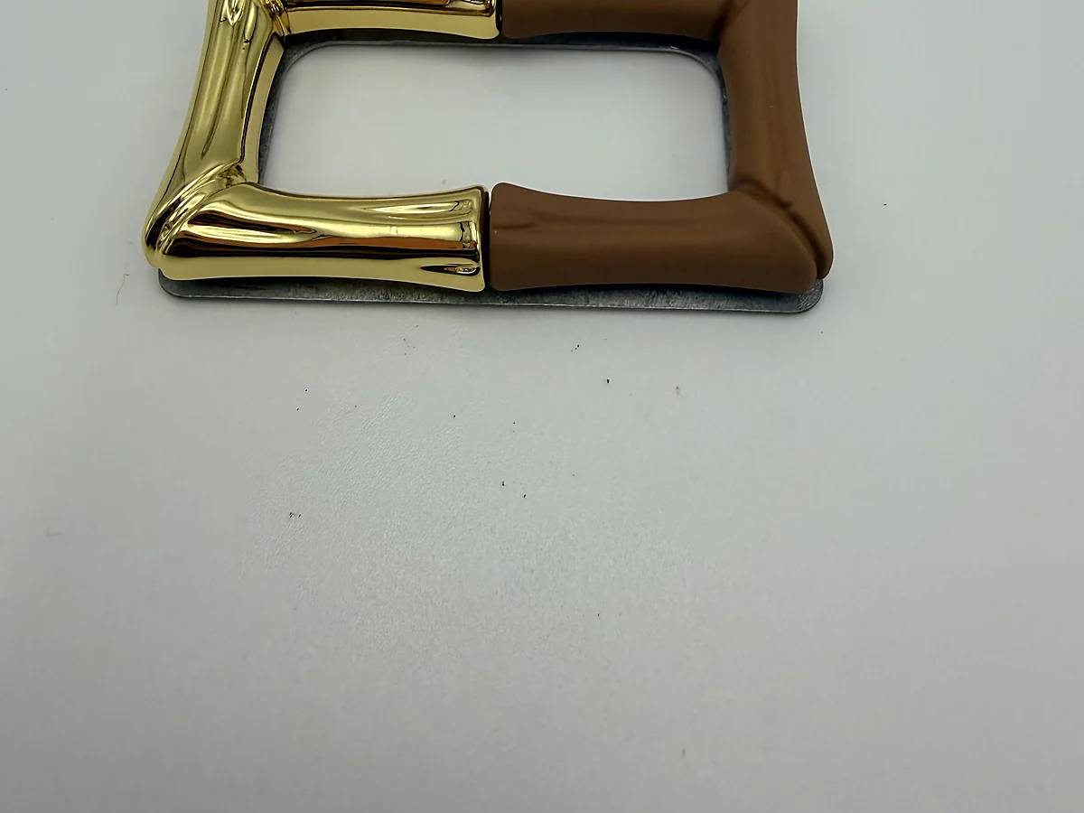 Gold rectangular buckle with brown inlay