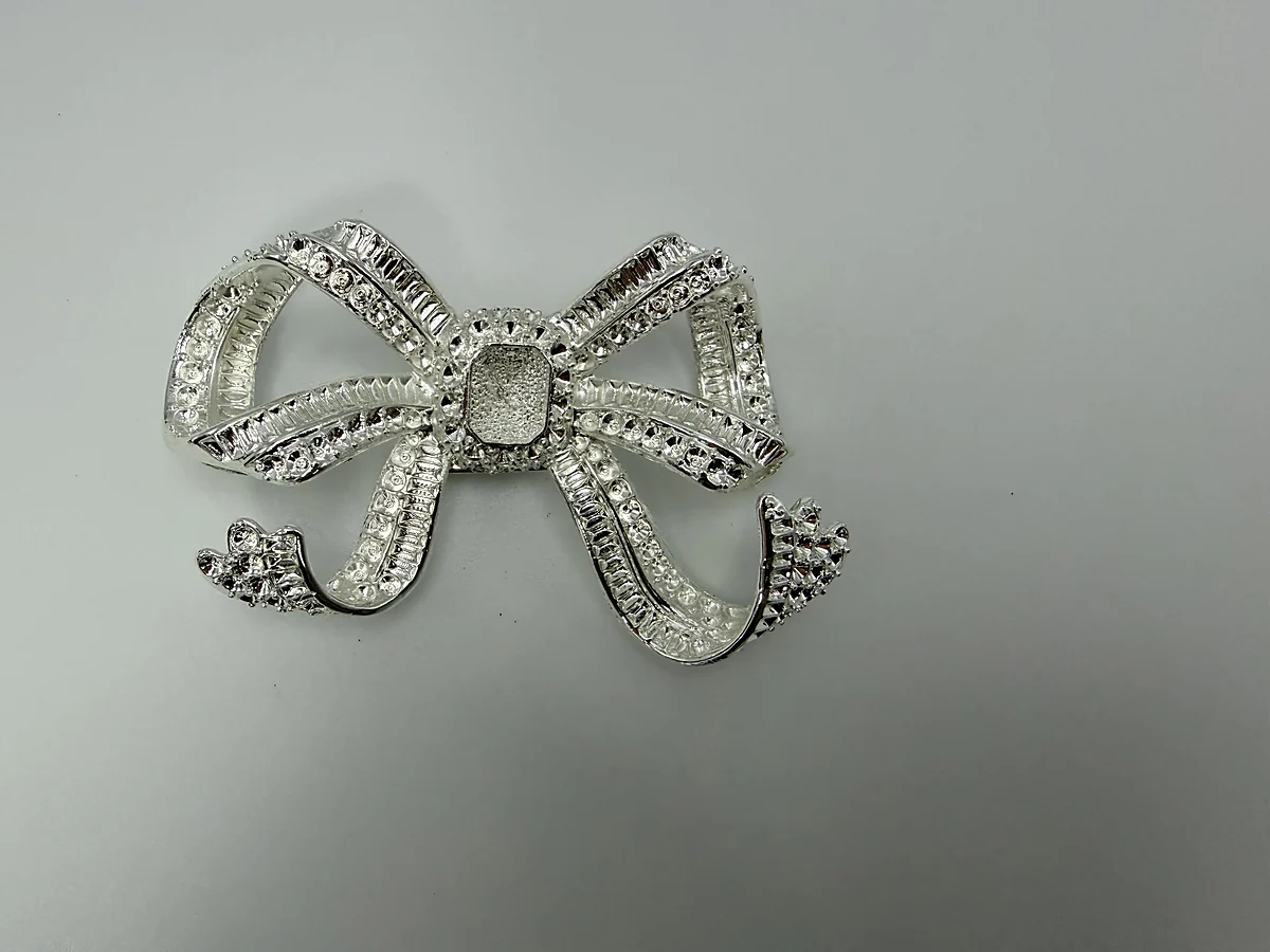 Silver decorative bow hardware with crystal detailing