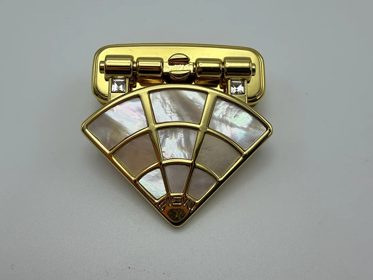 Fan-shaped gold decorative hardware with light inlay