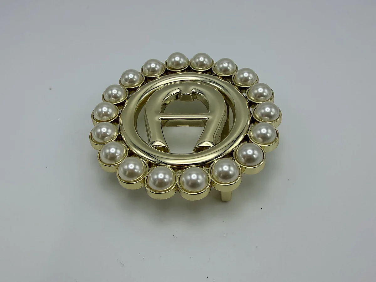 Gold pearl-ring decorative component for cosmetic packaging applications