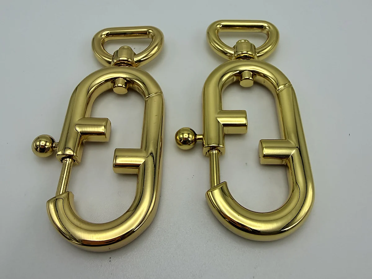 Gold snap hook pair for functional review