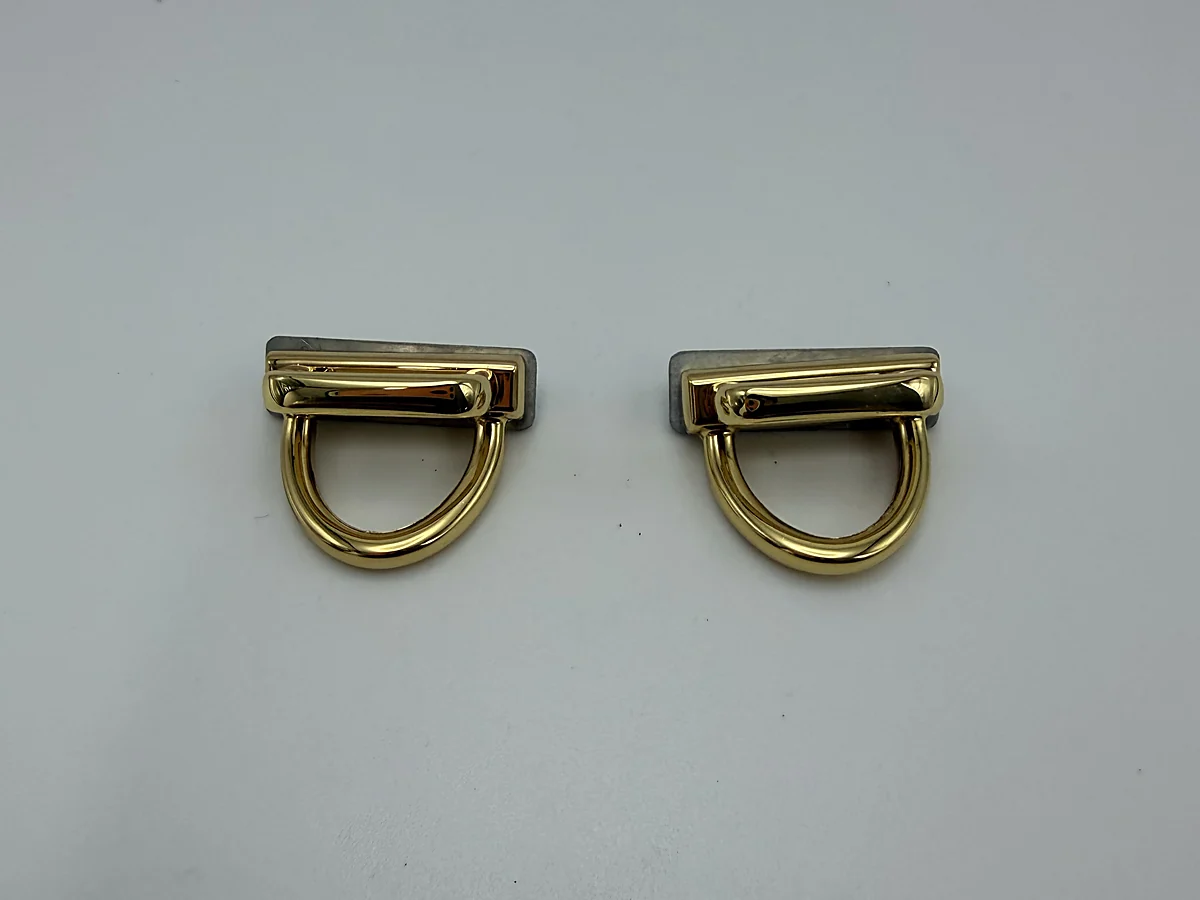 Pair of gold bridge attachment fittings in an RFQ preparation guide