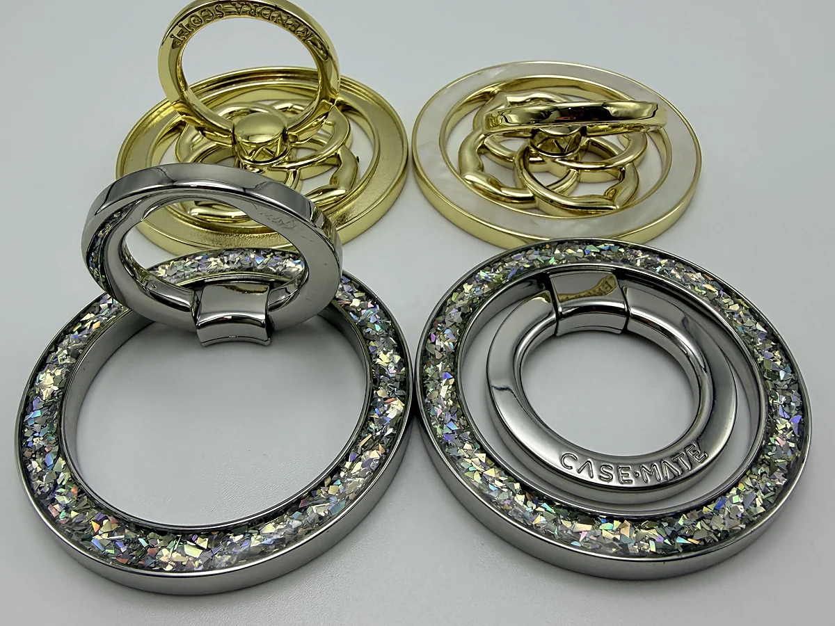 Gold and silver circular strap rings with crystal detailing