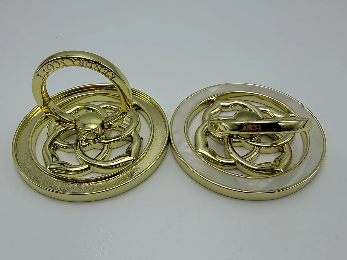 Gold circular ring set in a material comparison guide